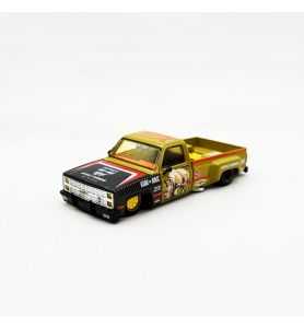 Mini GT Kaido House 1980 Chevrolet Silverado Sumatran Rhino Negro/Dorado 1/64